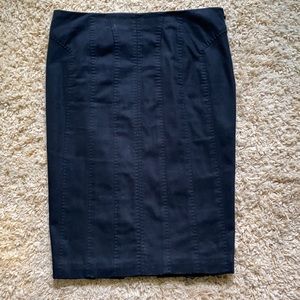 Gucci black Pencil skirt. Side zipper and pleated back lower bottom.